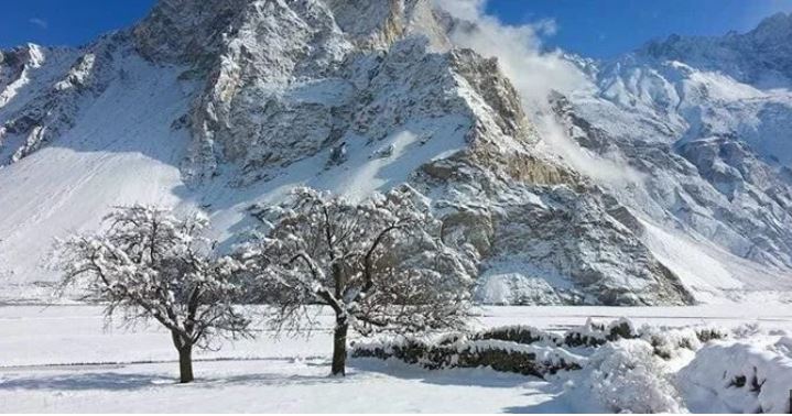 best places to visit in Pakistan with family in winter: Snow covered Hunza 